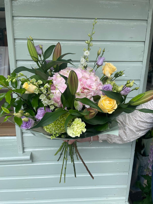 The Seasonal Splendor hand tied flower wrap